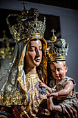 Seville, Spain, Oct 23 2016, Close up of a Renaissance-era Virgin and Child statue in Seville Cathedral, showcasing intricate artistry and religious symbolism in a renowned Spanish landmark.