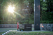 Praying, Atomic Bomb Hypocenter detonation point, Hypocenter Park, Nagasaki, Japan.