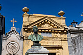 Architectural detail of an elaborate mausoleum and statue in the Recoleta Cemetery in Buenos Aires, Argentina.