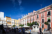 Seville, Spain, Nov 15 2009, Visitors enjoy the lively atmosphere of El Salvador square, surrounded by historic architecture and local vendors in Seville, Spain.