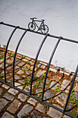 Bicycle parking racks with little bike sculptures, Prague