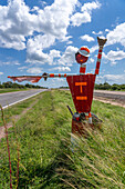 A metal flagman mannequin to warn of road construction near Termas de Rio Hondo, Santiago del Estero Province Argentina.