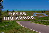 A painted sign on the side of the Rio Hondo Dam at Termas de Rio Hondo in Argentina.