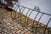 Bicycle parking racks with little bike sculptures, Prague