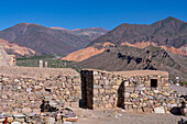 Partially reconstructed ruins in the Pucara of Tilcara, a pre-Hispanic archeological site near Tilcara, Humahuaca Valley, Argentina.