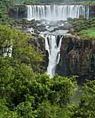 Iguazu Falls National Park in Argentina, as viewed from Brazil. A UNESCO World Heritage Site. Pictured Rivadavia Falls at top with one of the Three Musketeers Falls or Salto Tres Mosqueteros below.