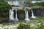 Iguazu Falls National Park in Argentina, as viewed from Brazil. A UNESCO World Heritage Site. Pictured is Rivadavia Falls at top with the Three Musketeers Falls or Salto Tres Mosqueteros below. At top right are the San Martin and Mbigua Falls.