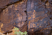 A pre-Hispanic Native American rock art or petroglyph panel in Nine Mile Canyon, Utah.