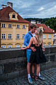 Young couple kissing in Prague