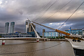 The bowsprit of the ARA Presidente Sarmiento & the Woman's Bridge over Dock 3 in Puerto Madero, Buenos Aires, Argentina.