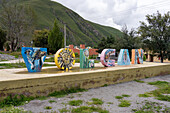 Three-dimensional town sign for the small pueblo of Volcan in the Quebrada de Humahuaca or Humahuaca Valley in Argentina.