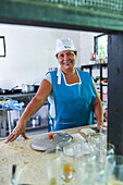 Portrait of smiling female cook in Colombia