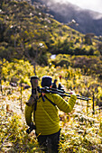 Young man hiking in the mountains of Sierra Nevada de Santa Marta, Colombia