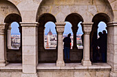 View of Parliament building, Chain Bridge and Danube River through old columns, Budapest, Hungary, Europe