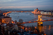 Illuminated Parliament building, Chain Bridge and Danube River at night, Budapest, Hungary, Europe