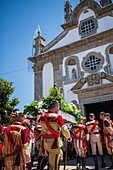 Religious procession enters São João Baptista Church during the Festival of Saint John of Sobrado, also known as Bugiada and Mouriscada de Sobrado, takes place in the form of a fight between Moors and Christians , locally known as Mourisqueiros and Bugios, Sao Joao de Sobrado, Portugal