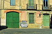 Signs in a road junction in the small town of Caballar, province of Segovia.