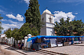 Vendors' stalls by the Cathedral of Our Lady of Candelaria in Humahuaca in the Quebrada de Humahuaca, Argentina.