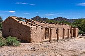 Ruins of the adobe buildings of a former hacienda near Seclantas in the Calchaqui Valley in the Salta Province of Argentina.