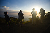 Hikers enjoying a beautiful sunset in Sierra Nevada de Santa Marta, Colombia