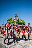 Religious procession enters São João Baptista Church during the Festival of Saint John of Sobrado, also known as Bugiada and Mouriscada de Sobrado, takes place in the form of a fight between Moors and Christians , locally known as Mourisqueiros and Bugios, Sao Joao de Sobrado, Portugal