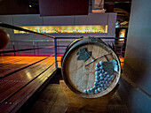 A decorated wooden wine barrel in the Museo de la Vid y el Vino or Museum of the Vine and the Wine in Cafayate, Argentina.