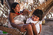 Kogi mamo (priest) and family. The Sierra Nevada de Santa Marta is home to the remnants of the Native American Tairona Culture. Koguis live in Resguardos Indigenas (Indian reserves) located in the mid-highland