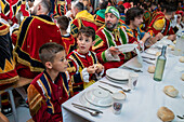 Traditional lunch at The Festival of Saint John of Sobrado, also known as Bugiada and Mouriscada de Sobrado, takes place in the form of a fight between Moors and Christians , locally known as Mourisqueiros and Bugios, Sao Joao de Sobrado, Portugal