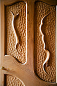 Barcelona, Spain, Sept 4 2008, The stunning wooden door at Casa Batlló showcases intricate carvings that reflect Gaudís artistic vision in Barcelona.