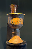 An antique Catholic sacramental wine goblet in the Museum of the Vine and the Wine in Cafayate, Argentina.