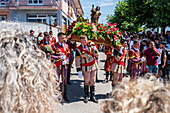 Religious procession finishing at São João Baptista Church during the Festival of Saint John of Sobrado, also known as Bugiada and Mouriscada de Sobrado, takes place in the form of a fight between Moors and Christians , locally known as Mourisqueiros and Bugios, Sao Joao de Sobrado, Portugal