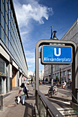 Berlin, Germany, July 27 2009, Visitors stroll through the lively Alexanderplatz area near the underground station, enjoying the vibrant city atmosphere.