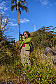 Female photographer in the mountains of Sierra Nevada de Santa Marta, Colombia