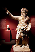 Berlin, Germany, July 24 2009, A performer dressed as Papposilenus brings ancient history to life in the Pergamon Museum, showcasing art from the 2nd century AD.