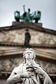 The iconic statue of Friedrich Schiller stands prominently in front of the Konzerthaus, showcasing German cultural heritage.