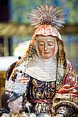 Seville, Spain, May 31 2009, Saint Anne holds the Virgin Mary in beautifully detailed sculptures within the Church of San Lorenzo, showcasing Baroque artistry.