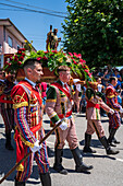 Religious procession finishing at São João Baptista Church during the Festival of Saint John of Sobrado, also known as Bugiada and Mouriscada de Sobrado, takes place in the form of a fight between Moors and Christians , locally known as Mourisqueiros and Bugios, Sao Joao de Sobrado, Portugal