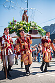 Religious procession finishing at São João Baptista Church during the Festival of Saint John of Sobrado, also known as Bugiada and Mouriscada de Sobrado, takes place in the form of a fight between Moors and Christians , locally known as Mourisqueiros and Bugios, Sao Joao de Sobrado, Portugal