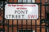 The sign for Pont Street in Kensington highlights the Royal Borough of Chelsea, capturing a glimpse of London’s urban charm.