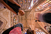 Leon, Spain, Aug 21 2008, Guests appreciate the stunning stained glass while standing in the grand cathedral in León, Spain on a beautiful day.