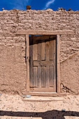 Ruins of the adobe buildings of a former hacienda near Seclantas in the Calchaqui Valley in the Salta Province of Argentina.