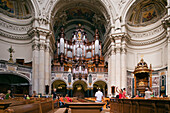 Berlin, Germany, July 21 2009, Visitors admire the ornate architecture of the Berliner Dom and its grand organ in the heart of Berlin, showcasing historical beauty.