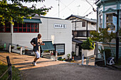 Runner in Philosopher's Walk in Kyoto, Japan