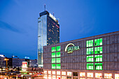 Berlin, Germany, July 21 2009, The bright lights of Galeria Kaufhof and Park Inn Hotel illuminate Alexanderplatz in Berlin during the evening.