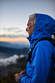 Man enjoys a sunrise in Sierra Nevada de Santa Marta, Colombia