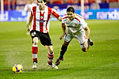 Seville, Spain, Feb 4 2009, Javier Martínez of Athletic and Renato of Sevilla fight for possession during the Copa del Rey semifinal on February 4, 2009.