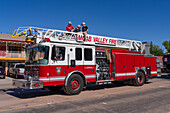 A fire department ladder truck in the Fourth of July Parade on Independence Day in Moab, Utah.