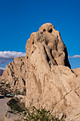 Route 40, an unpaved dirt road through the eroded landscape of the Angastaco Natural Monument in the Calchaqui Valley, Argentina.