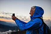 Man enjoys a sunrise in Sierra Nevada de Santa Marta, Colombia