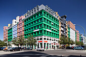 Explore the vibrant postmodernist building by Aldo Rossi at the intersection of Charlottenstrasse and Zimmerstrasse in Berlin.